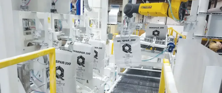 Revolutionizing Packaging Efficiency with Advanced Bag-Filling Equipment | Robotic integration in packaging systems | Critical Minerals