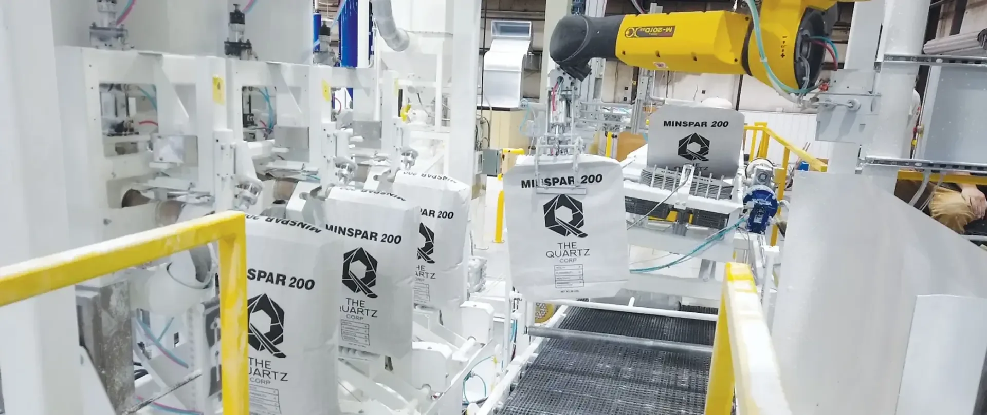Revolutionizing Packaging Efficiency with Advanced Bag-Filling Equipment | Robotic integration in packaging systems | Critical Minerals